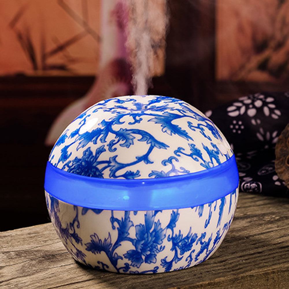 Mini Home Aroma Diffuser with blue floral design and USB connectivity.