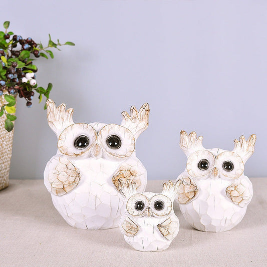 Auspicious animal home decoration featuring resin owl crafts in modern style.