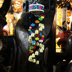 Colorful home wind chime with bells and wooden fish.