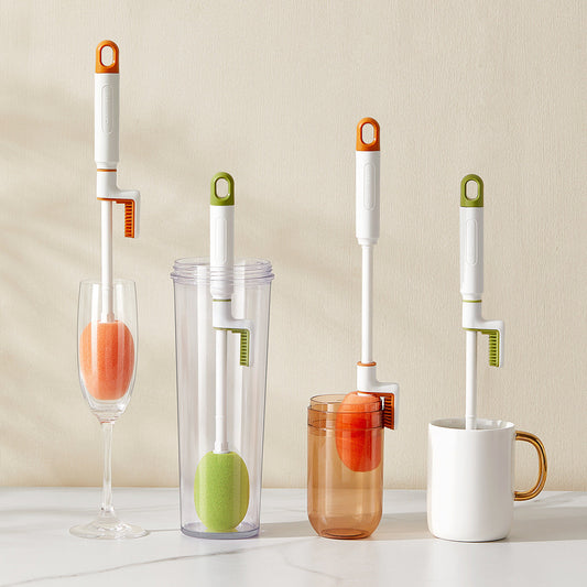Long handle cup brush for cleaning various glasses and bottles, shown in orange and army green.