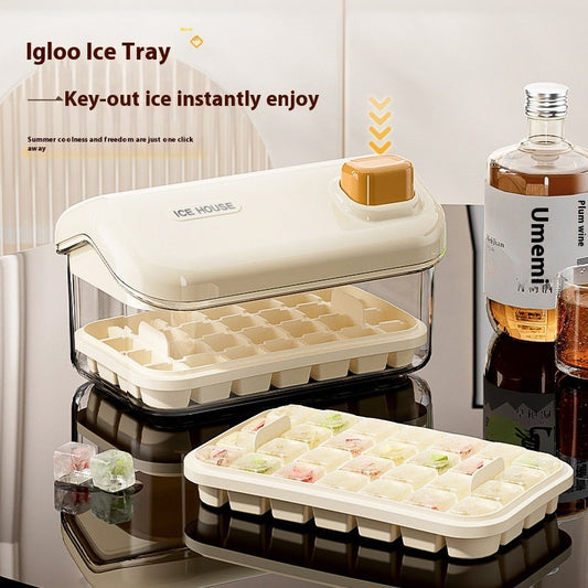 Large capacity ice tray with press for easy release, cream white and apricot colors, food-grade material, suitable for kitchen use.
