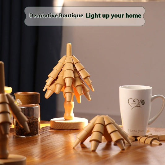 Wooden beech heat proof mat with decorative stacking design displayed alongside a mug.